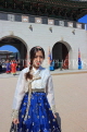 South Korea, SEOUL, Gyeongbokgung Palace, visitor in traditional Hanbok attire, SK496JPL