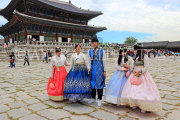 South Korea, SEOUL, Gyeongbokgung Palace, visitors in Hanbok attire posing for photos, SK349JPL