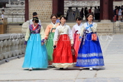 South Korea, SEOUL, Gyeongbokgung Palace, visitors in colourful Hanbok attire, SK37JPL