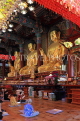 South Korea, SEOUL, Jogyesa Temple, golden Buddha statues and worshippers, SK289JPL
