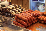 South Korea, SEOUL, Myeongdong, street food, food stalls, Bacon wrapped sausages, SK1331JPL