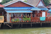 THAILAND, Bangkok, Chao Phraya River, residential houses on stilts, THA3509JPL
