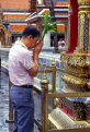THAILAND, Bangkok, GRAND PALACE (Wat Phra Keo), worshipper at a shrine, THA1979JPL