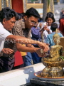 THAILAND, Bangkok, GRAND PALACE, worshippers bathing Buddha image, Songkran (New Year), THA730JPL