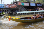 THAILAND, Damnoen Saduak (Floating Market), tourists on longlail boat ride, THA2975JPL