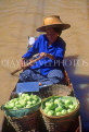 THAILAND, Damnoen Saduak (Floating Market), vendor in sampan with fruit, THA1870JPL
