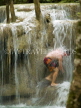 THAILAND, Kanchanaburi, Erawan Falls National Park, tourist bathing at falls, THA1950JPL