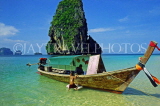 THAILAND, Krabi, Hat Thram Phra Nang, rock outcrops and boat, THA1340JPL