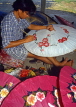 THAILAND, Northern Thailand, Chiang Mai, artist painting parasols, THA1671JPL