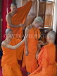 THAILAND, Northern Thailand, Mae Hong Son, novice monk being dressed in robes, THA2075JPL