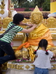 THAILAND, Northern Thailand, Nakhon Phanom, Wat Phra That Phanom, worshippers, THA2141JPL
