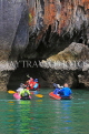 THAILAND, Phang Nga Bay, Panak Island, tourists exploring caves by sea canoe, THA4269JPL