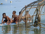 THAILAND, Phuket, Rawai Beach, children plaing with surfboard, by fish trap, THA2009JPLS
