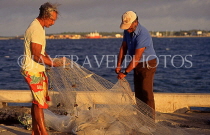 TONGA, Nukualofa, fishermen sorting out nets, TON194JPL