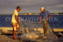 TONGA, Nukualofa, fishermen sorting out nets, TON2248JPL