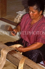 TONGA, Nukualofa, making Tapa cloth (from Paper Mulberry tree), beating the Tapa, TON229JPL