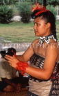 TONGA, Nukualofa, woman performing Kava ceremony, Kava drink in bowl, TON181JPL