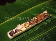 TONGA, Tongan Feast, meat and vegetable cooked in hollowed out banana stem, TON106JPL