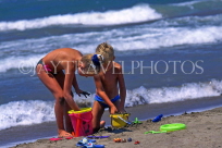 TURKEY, Dalyan Coast, Iztuzu beach, two children playing, TUR698JPL