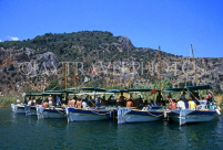 TURKEY, Dalyan Delta, tour boats at site of Lycian Rock Tombs, TUR609JPL