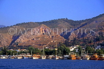 TURKEY, Fethiye, coastal view with pleasure boats lined up, TUR589JPL