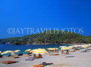 TURKEY, Fethiye area, Olu Deniz, beach and sunbathers, TUR296JPL