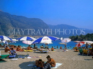 TURKEY, Fethiye area, Olu Deniz, beach and sunbathers, TUR307JPLA