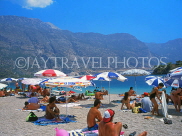 TURKEY, Fethiye area, Olu Deniz, beach and sunbathers, TUR310JPL