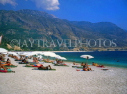 TURKEY, Fethiye area, Olu Deniz, beach and sunbathers, TUR312JPLA