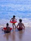 TURKEY, Fethiye area, Olu Deniz, family playing on beach, TUR333JPL