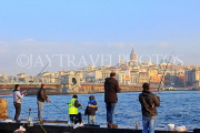 TURKEY, Istanbul, Eminonu Waterfront, and people fishing, TUR1344JPL