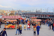TURKEY, Istanbul, Eminonu Waterfront, food stalls, crowds and Galata Bridge, TUR967JPL