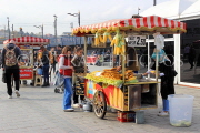 TURKEY, Istanbul, Eminonu Waterfront, street food, corn and chestnut stalls, TUR982JPL