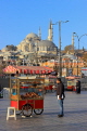 TURKEY, Istanbul, Eminonu Waterfront, street food stalls, Blue Mosque in background, TUR1410JPL