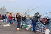 TURKEY, Istanbul, Galata Bridge, people fishing, TUR996PL