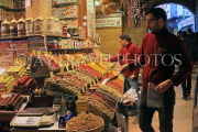 TURKEY, Istanbul, Spice Bazaar (Egyptian Bazaar), vendors at shop, spices and nuts, TUR1378JPL