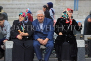 TURKEY, Istanbul, people seated on bench, TUR1401JPL