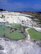 TURKEY, Pamukkale, chalkstone terraces, visitors bathing in thermal springs, TUR253JPL