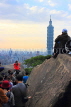 Taiwan, TAIPEI, Elephant Mountain, visitors viewing Taipei 101 from peak, at dusk, TAW450JPL