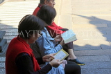 Taiwan, TAIPEI, Lungshan Temple, people reading Buddhist scriptures, TAW696JPL