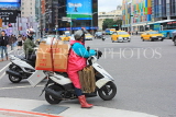 Taiwan, TAIPEI, Ximending Shopping District, moped rider with heavy lead, TAW1309JPL