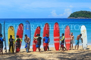 Thailand, PHUKET, Kata Beach, Surfers grouped together on beach for a photo, THA3827JPL