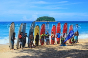 Thailand, PHUKET, Kata Beach, Surfers grouped together on beach for a photo, THA3828JPL
