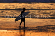 Thailand, PHUKET, Kata Beach, sunset, dusk, surfer with his surfboard, THA3740JPL