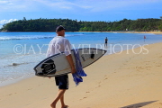 Thailand, PHUKET, Kata Beach, surfer with his surfboard, THA37890PL