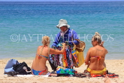 Thailand, PHUKET, Patong Beach, beach vendor and sunbathers, THA4079JPL