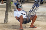 Thailand, PHUKET, Patong Beach, man having a nap on hammock, THA4092JPL