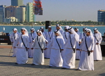 UAE, ABU DHABI, The Corniche, men performing a traditional cultural show, UAE689JPL