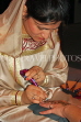UAE, DUBAI, Henna (Mendi) design artist, painting on a hand, UAE274JPL