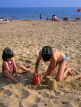 UK, Dorset, BOURNEMOUTH, beach, children playing with bucket and spade, DOR718JPL